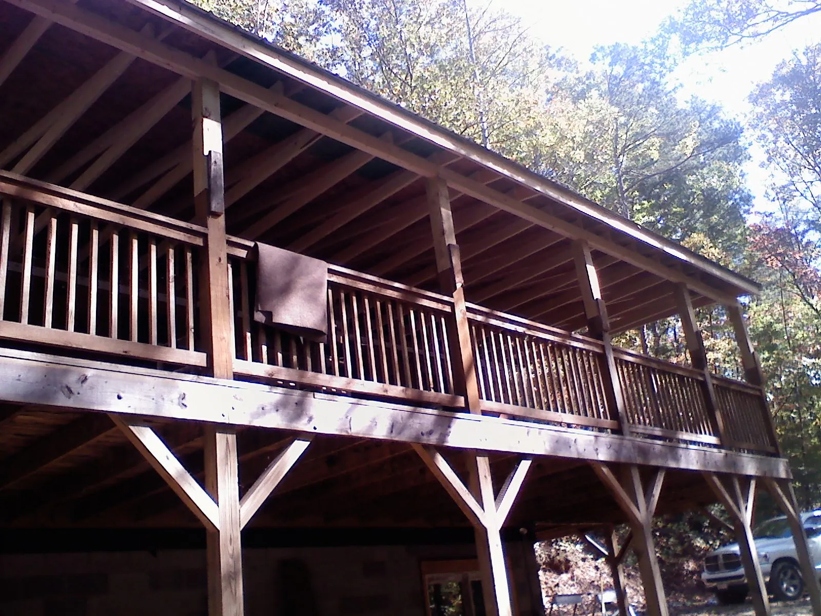 Timber framing under a new elevated porch and deck — Roof Leak Repair in Driggs by Roofing Brothers